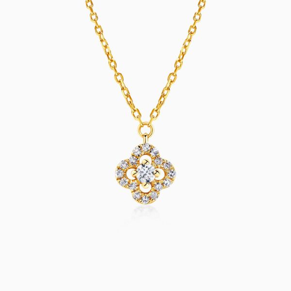 złoty naszyjnik z kwiatowym wzorem dekolt v - savicki